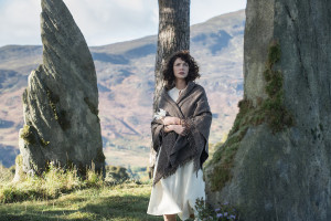 Claire Randall (Caitriona Balfe) and the henge of Craigh na Dun.